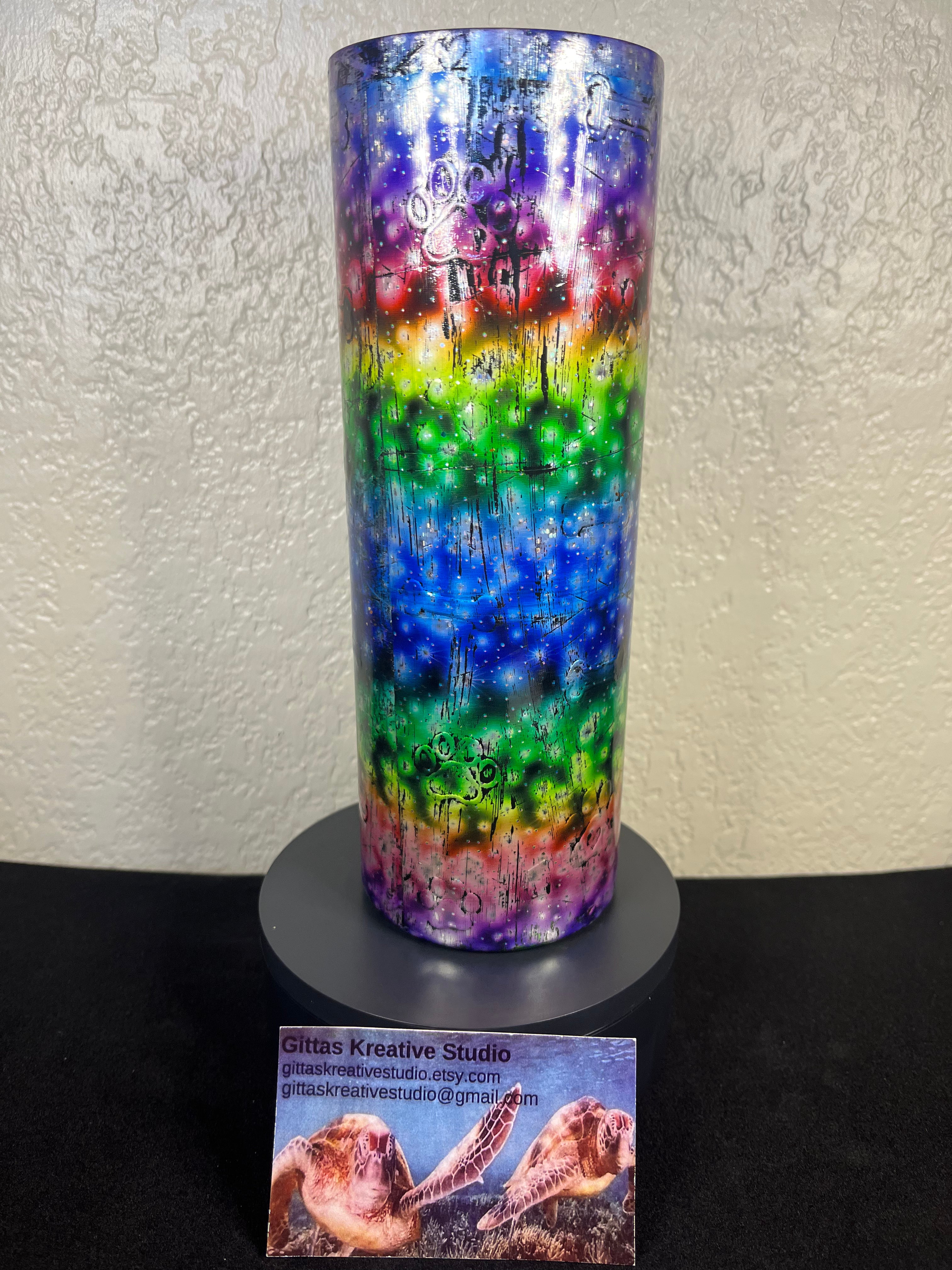 12. 20oz Rainbow Color Paw and Bone Tumbler