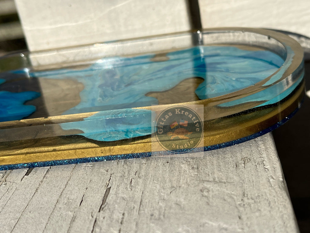 Gold and blue  resin oval tray or trinket dish