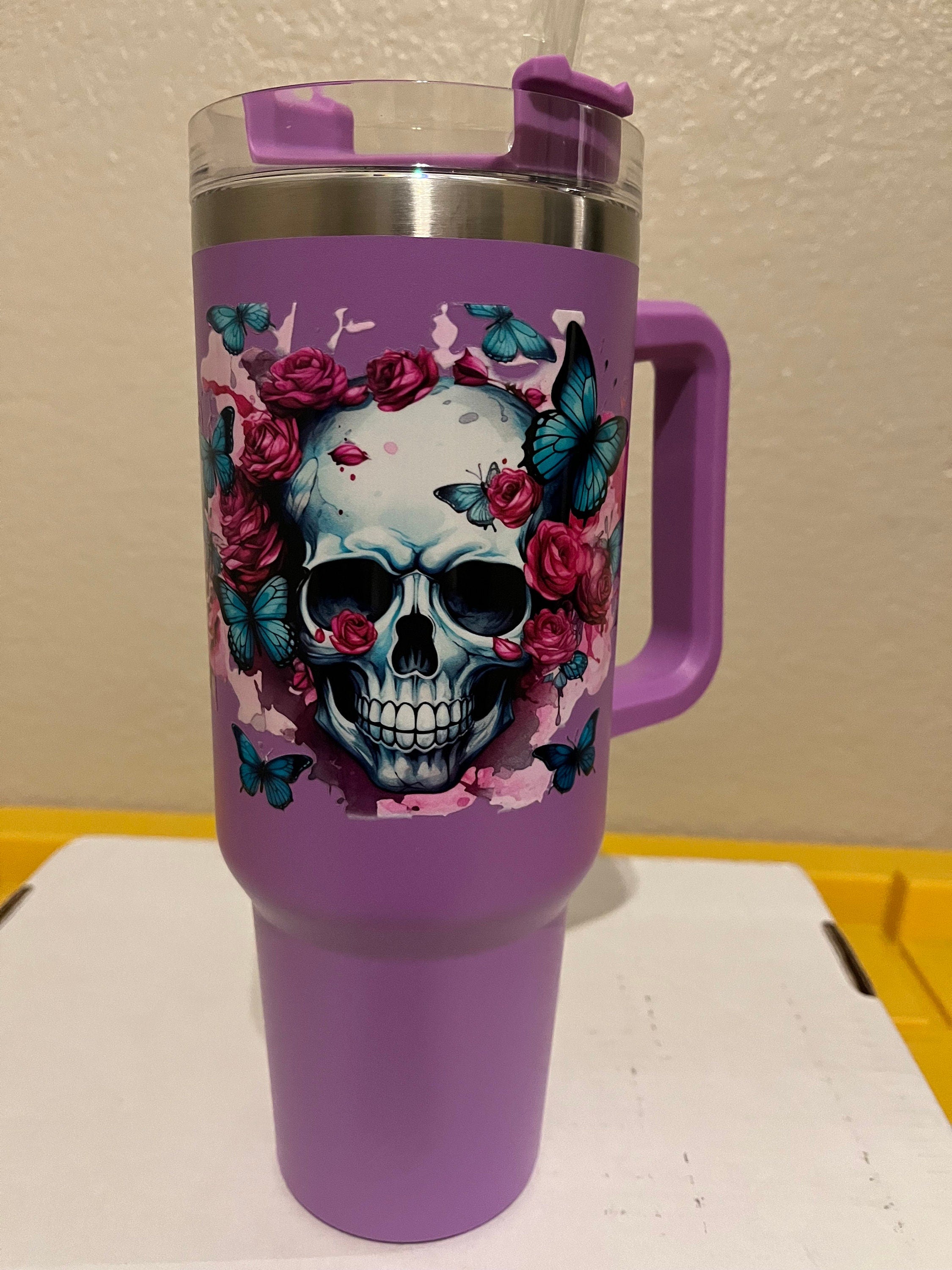 40oz  stainless steel tumbler with roses, butterflies and a skull