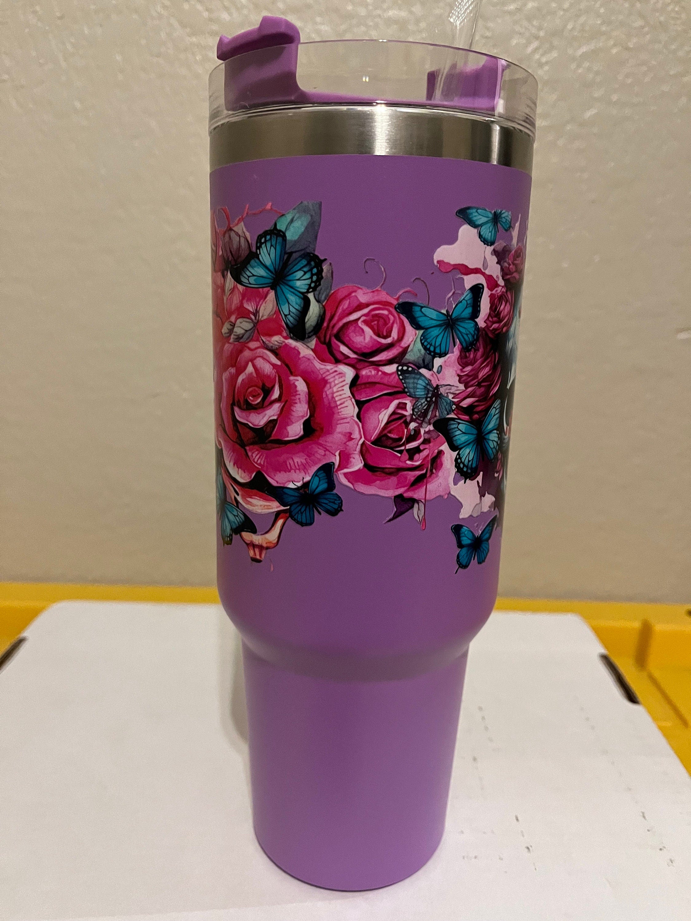40oz  stainless steel tumbler with roses, butterflies and a skull